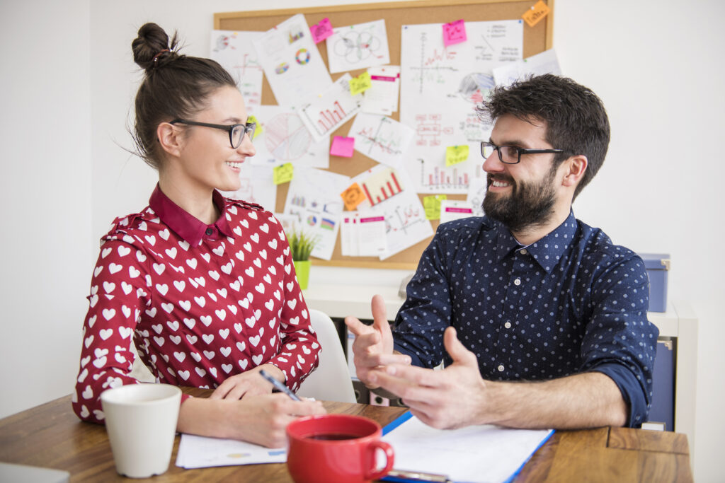 Business professional using E-A-T principles to strengthen brand reputation and trust in marketing and advertising efforts.